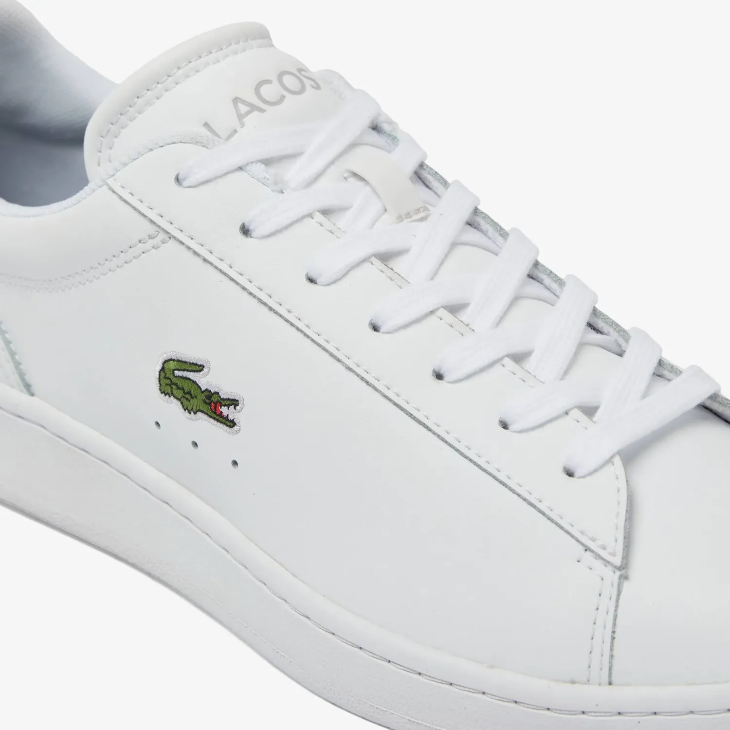 LACOSTE alt=