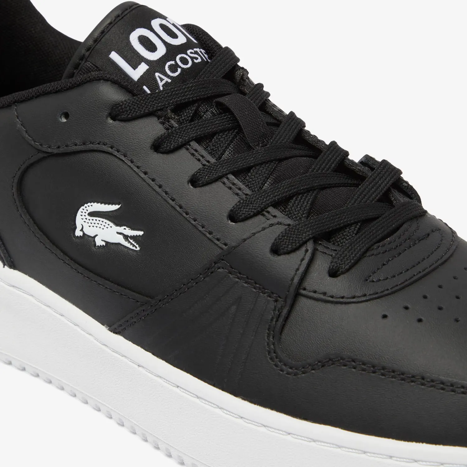 LACOSTE alt=