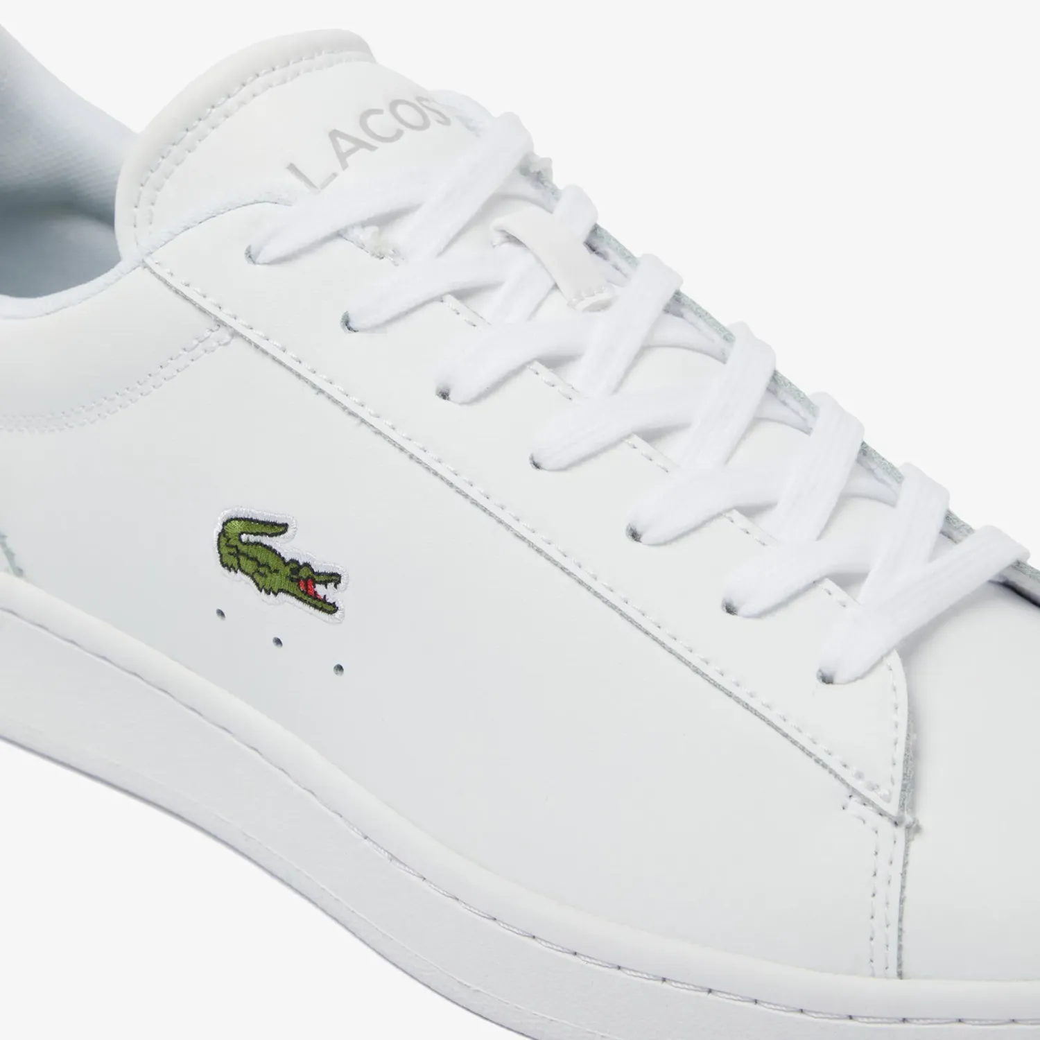 LACOSTE alt=