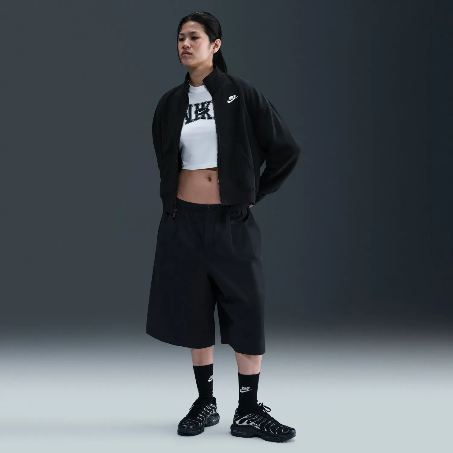 Casaca Nike Sportswear Mujer Club Fleece Loose Track color negro | Platanitos