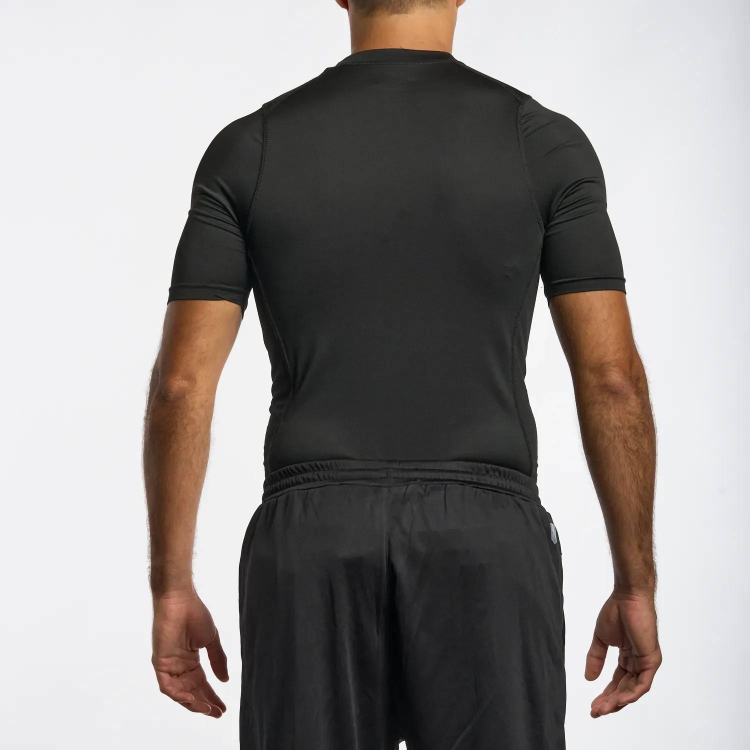 Polo Umbro Deportivo Hombre Ss Core Performance Baselayer color negro | Platanitos