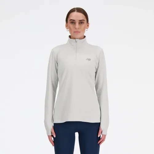 Casaca New Balance Training Mujer Sport Space Dye 1/4 Zip color gris | Platanitos