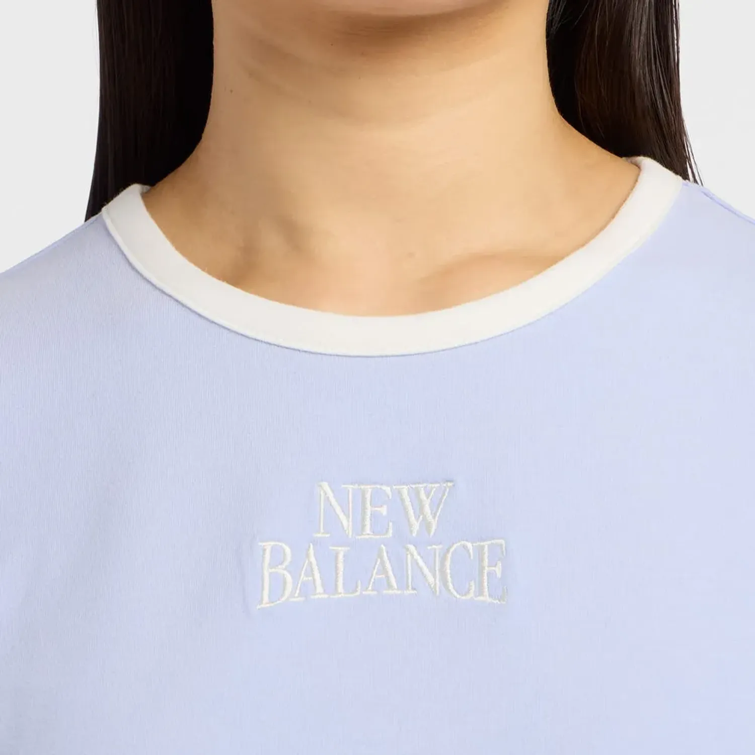 New Balance Polo New Balance Lifestyle Mujer Heritage Ringer color celeste / blanco | Platanitos