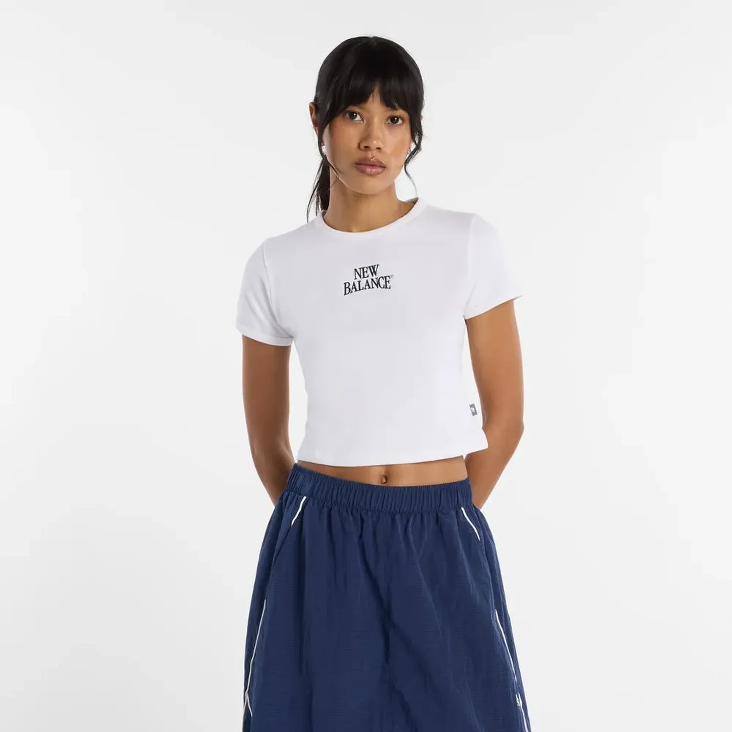 Polo New Balance Lifestyle Mujer Heritage Ringer color blanco | Platanitos