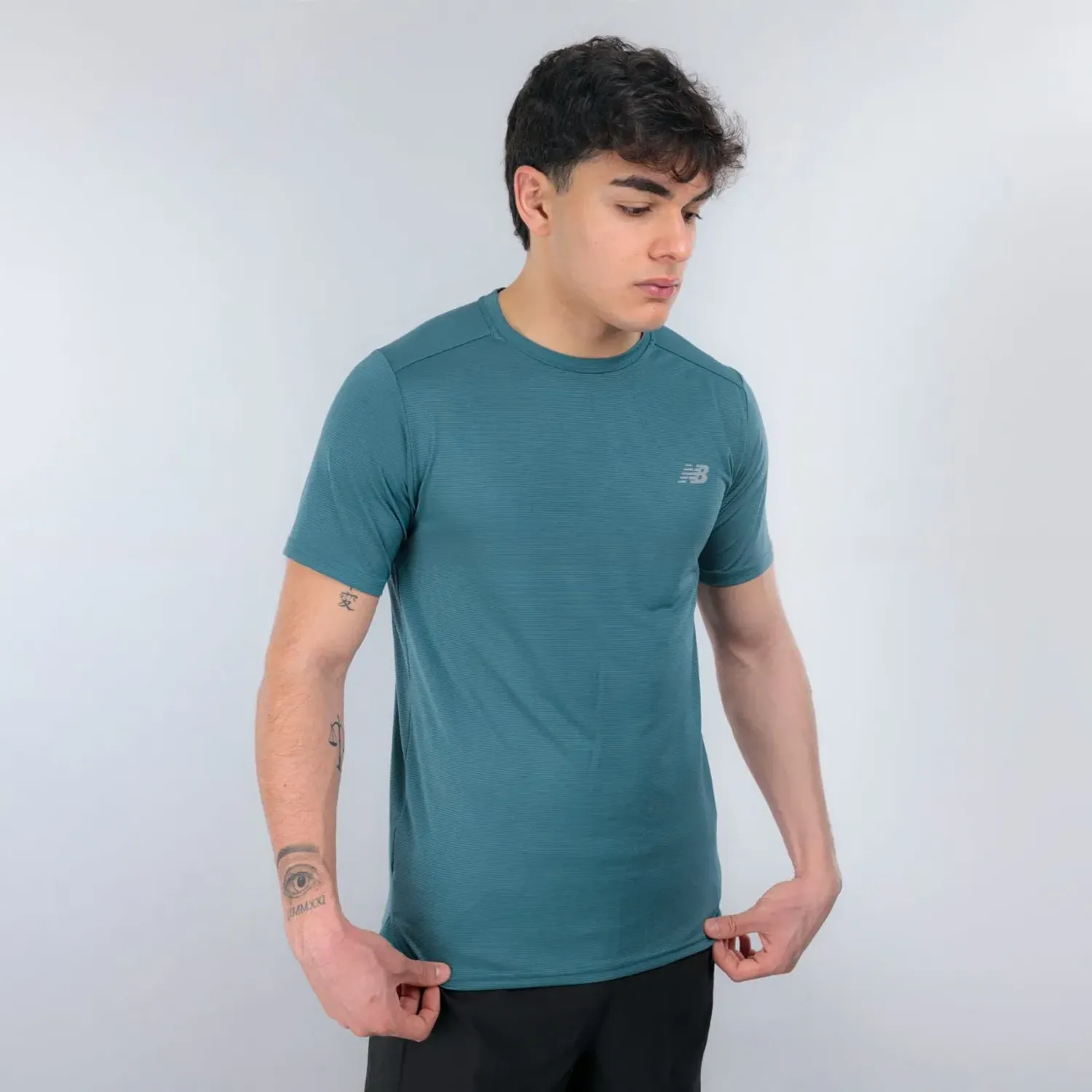 Bividi New Balance Running Hombre Sport Essentials color teal | Platanitos