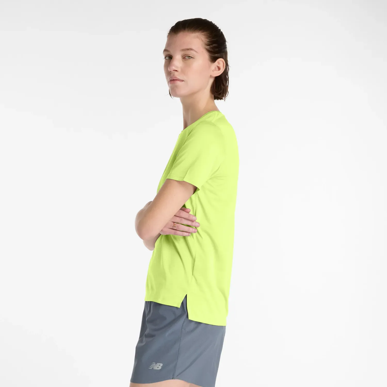 New Balance Polo New Balance Running Mujer Sport Essentials color amarillo | Platanitos