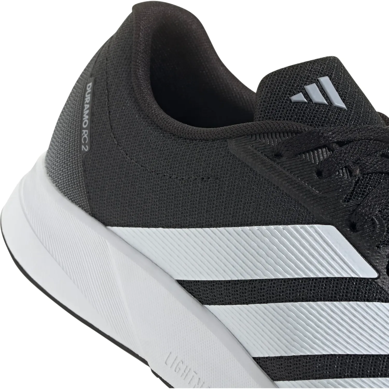 Zapatillas Adidas Running Hombre Duramo Rc2 M color negro / blanco | Platanitos