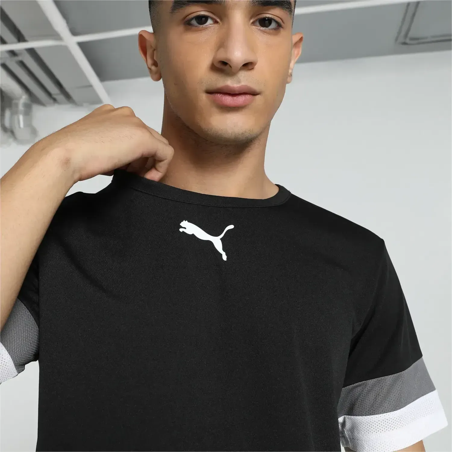 Polo Puma Deportiva Hombre Teamrise Jersey color negro | Platanitos