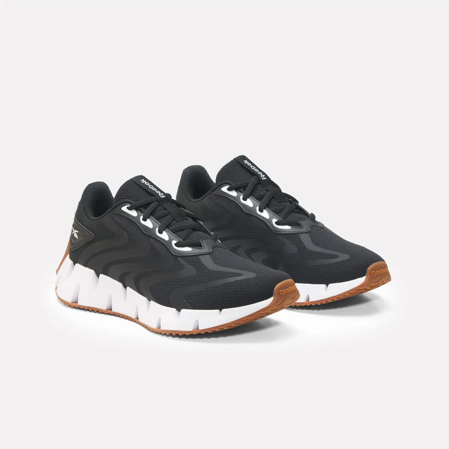 Zapatillas Reebok Running Mujer Zig Rise color negro | Platanitos