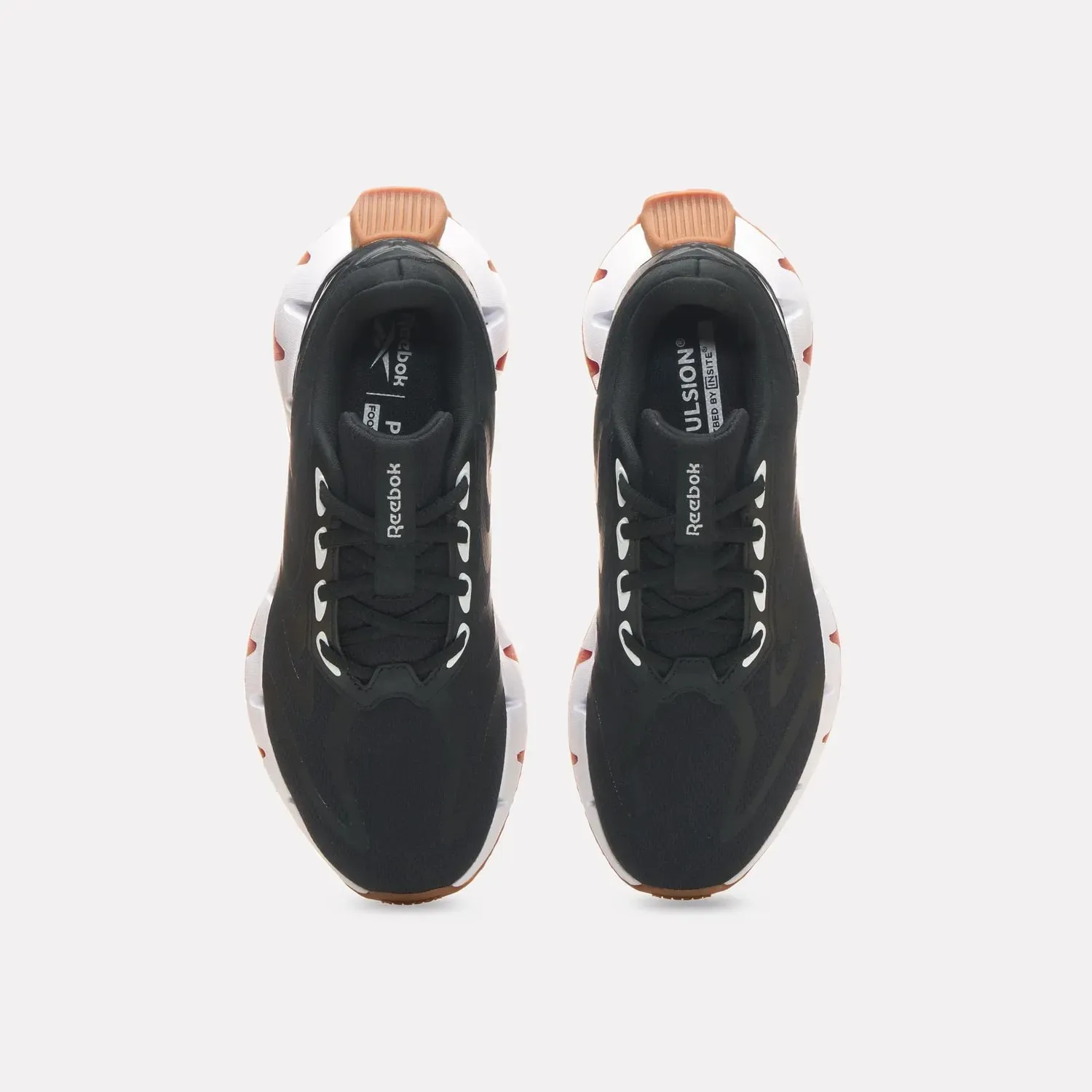 Zapatillas Reebok Running Mujer Zig Rise color negro | Platanitos