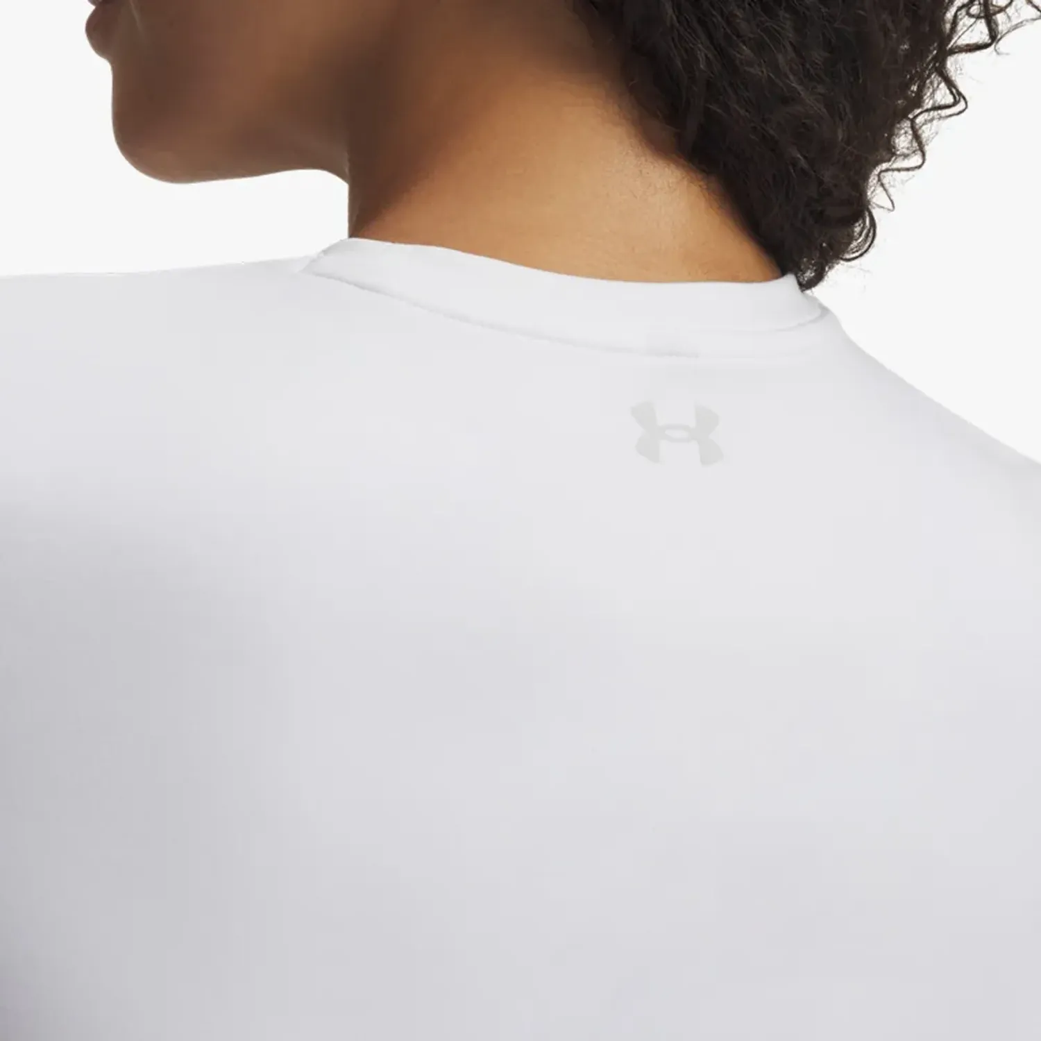 Polo Under Armour Training Mujer Motion Fitted color blanco | Platanitos