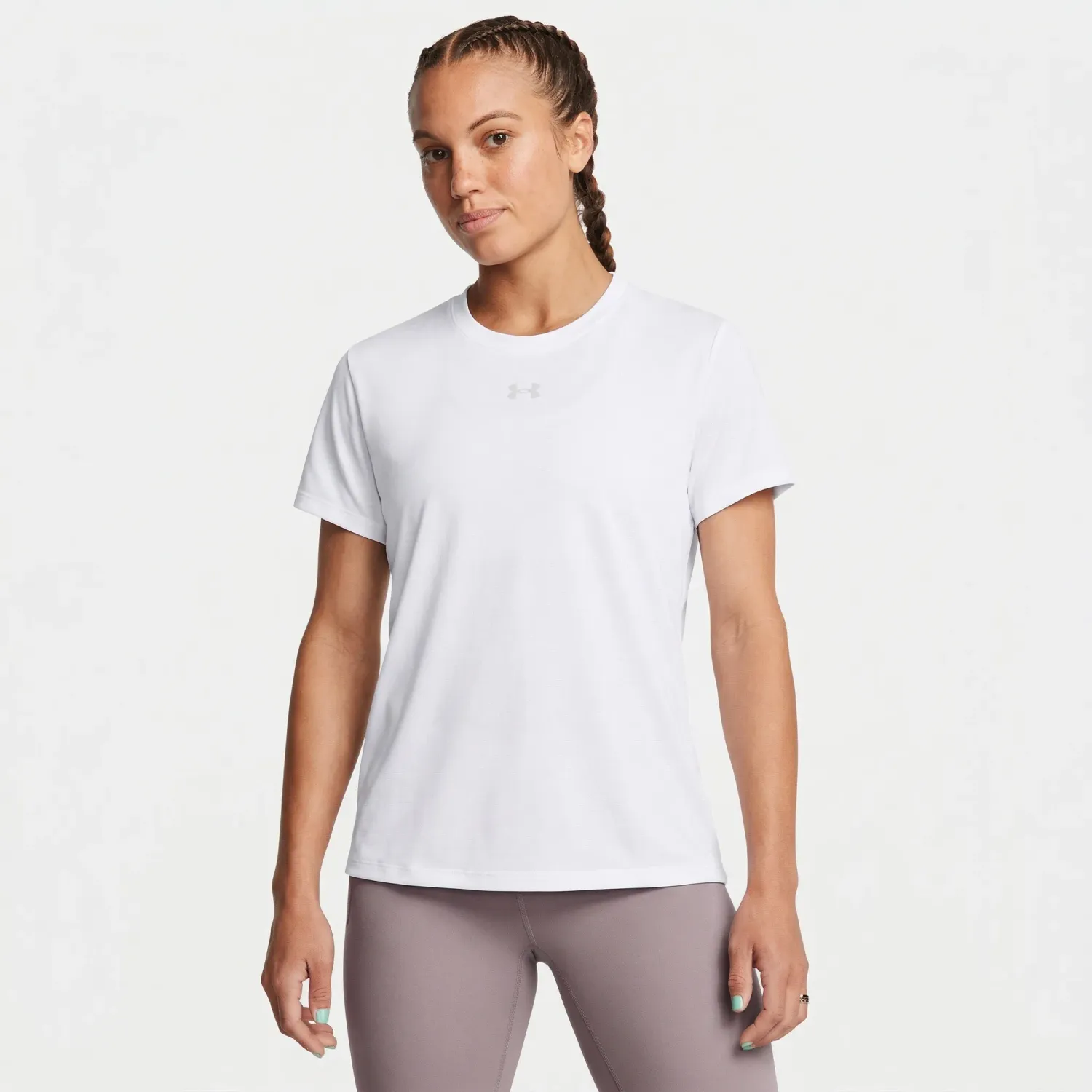 Polo Under Armour Training Mujer Simple Branded Ss color blanco | Platanitos