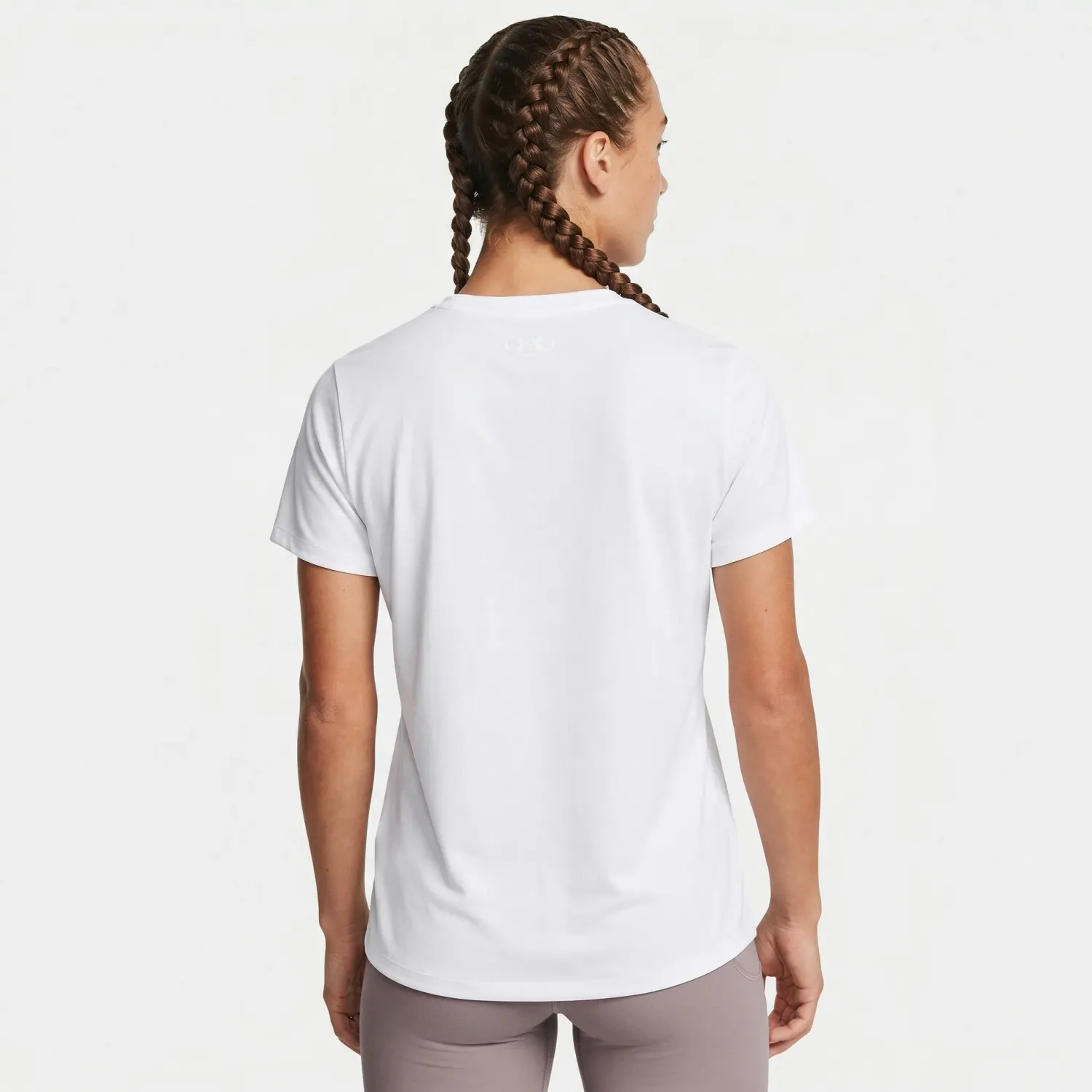 Polo Under Armour Training Mujer Simple Branded Ss color blanco | Platanitos