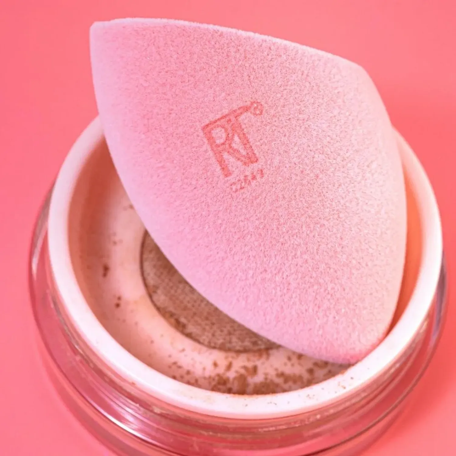 Rt Real Techniques Esponja Miracle Powder color rosado | Platanitos