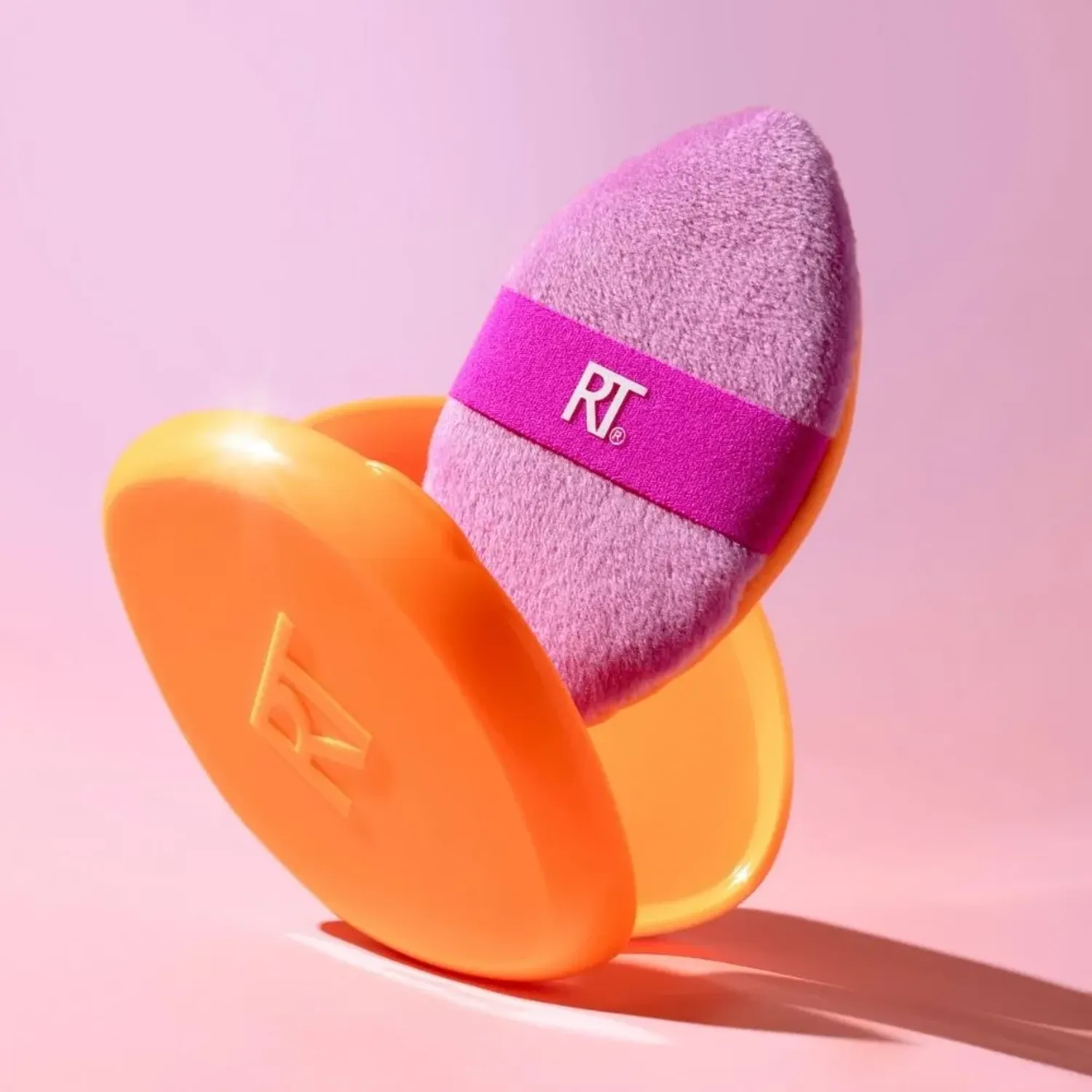 Rt Real Techniques Esponja Miracle 2-In-1 Powder Puff+case color morado / naranja | Platanitos