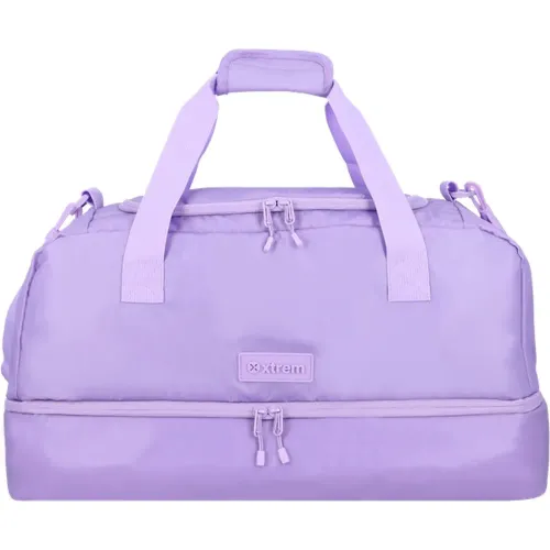 Bolso Xtrem Deportivo Unisex Brisbane 4xt color morado | Platanitos