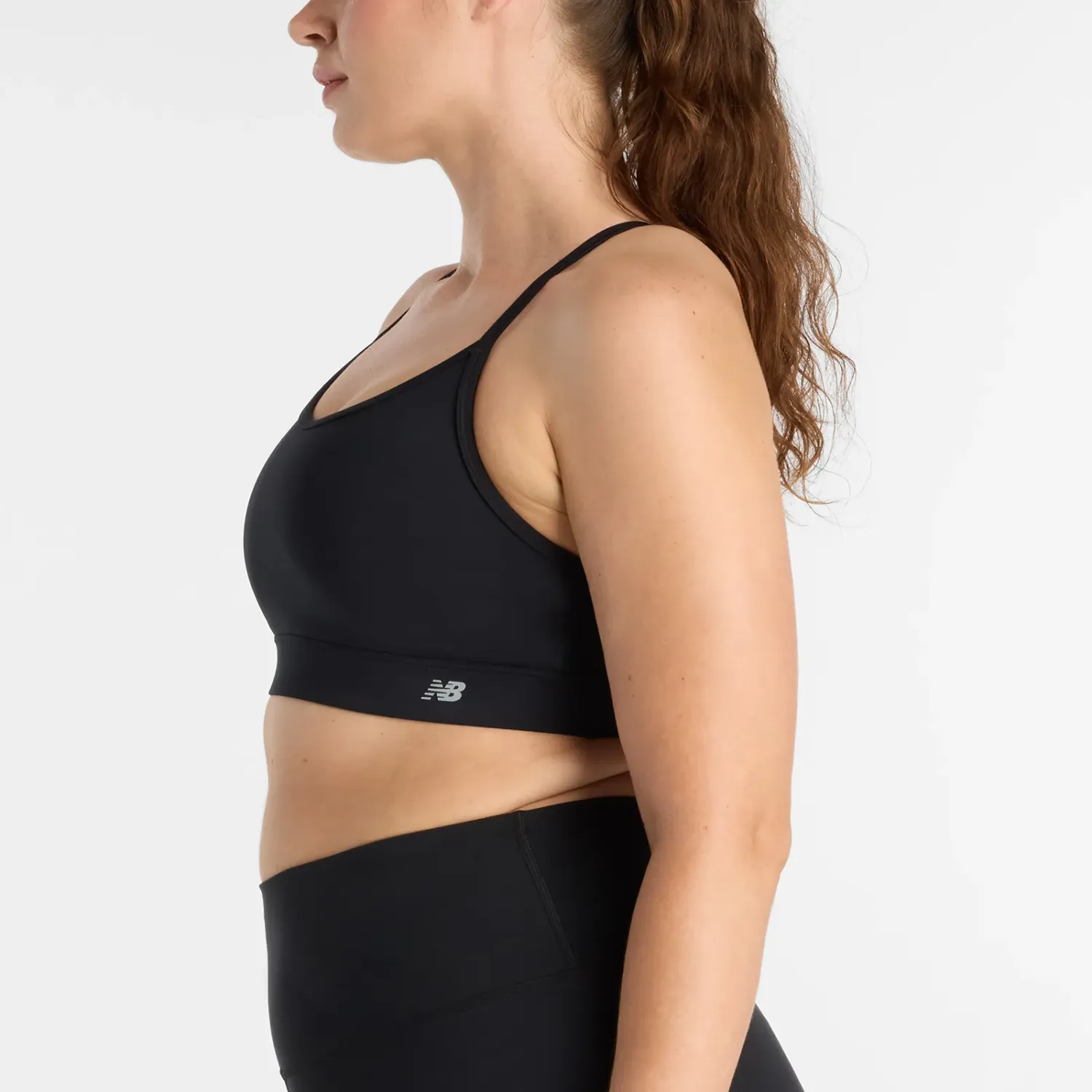 New Balance Top New Balance Deportivo Mujer Essential Yoga Bra color negro | Platanitos
