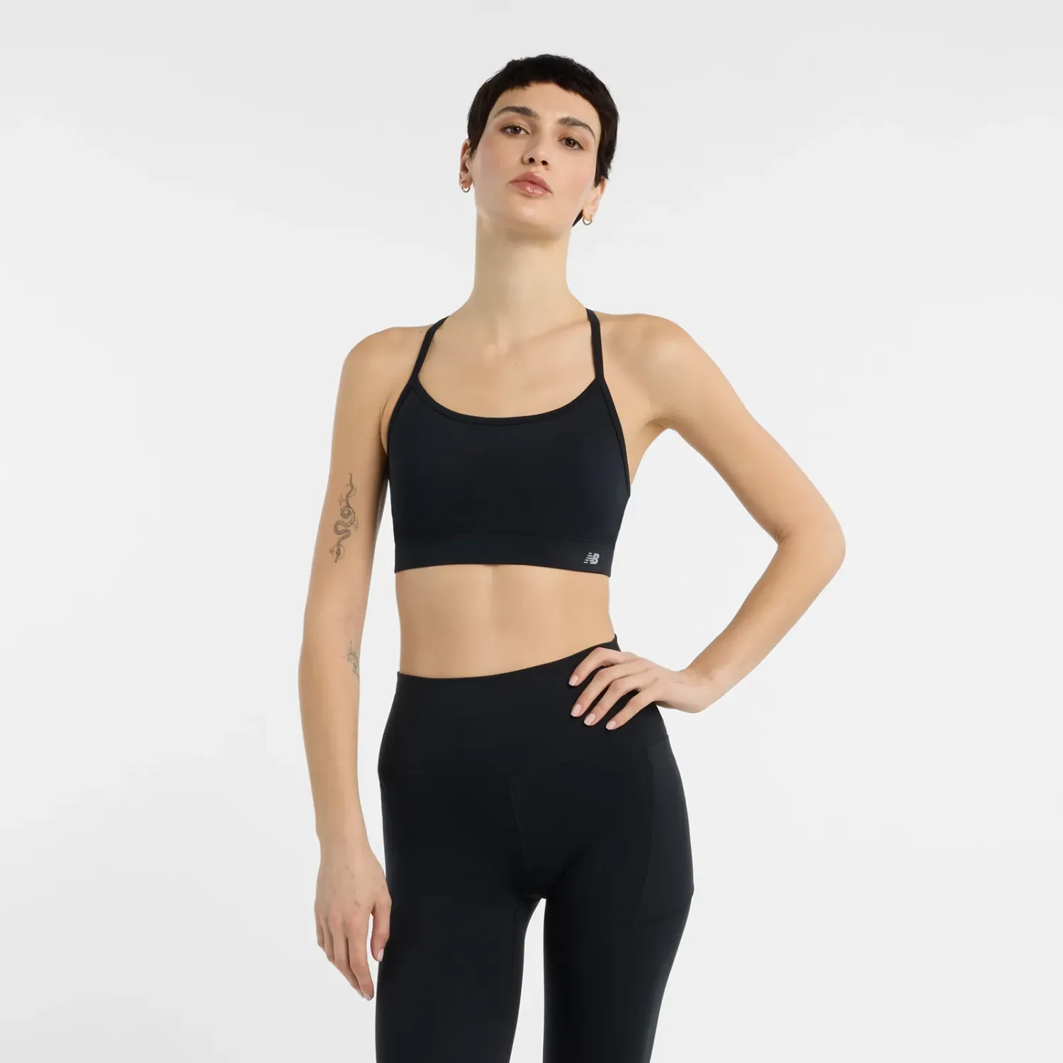 New Balance Top New Balance Deportivo Mujer Essential Yoga Bra color negro | Platanitos