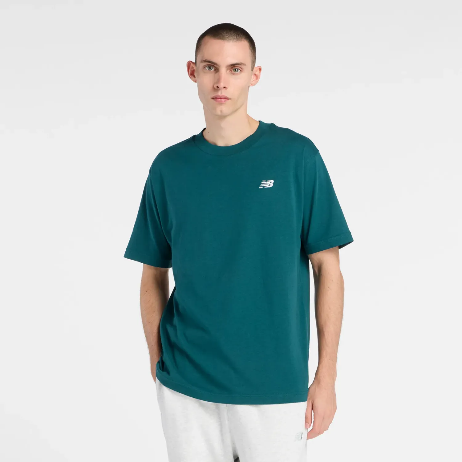 New Balance Polo New Balance Deportivo Sport Essentials color verde | Platanitos