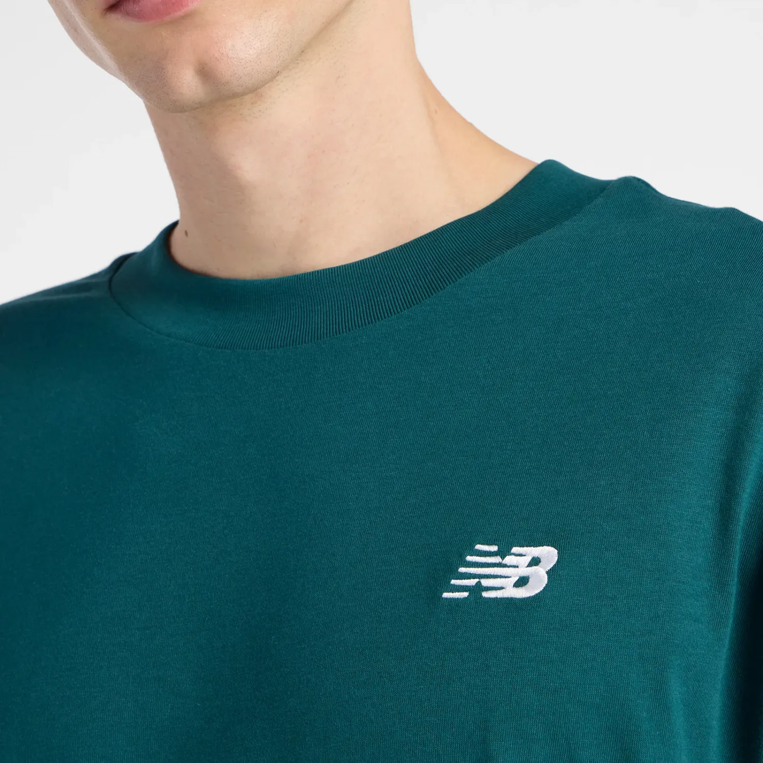 New Balance Polo New Balance Deportivo Sport Essentials color verde | Platanitos