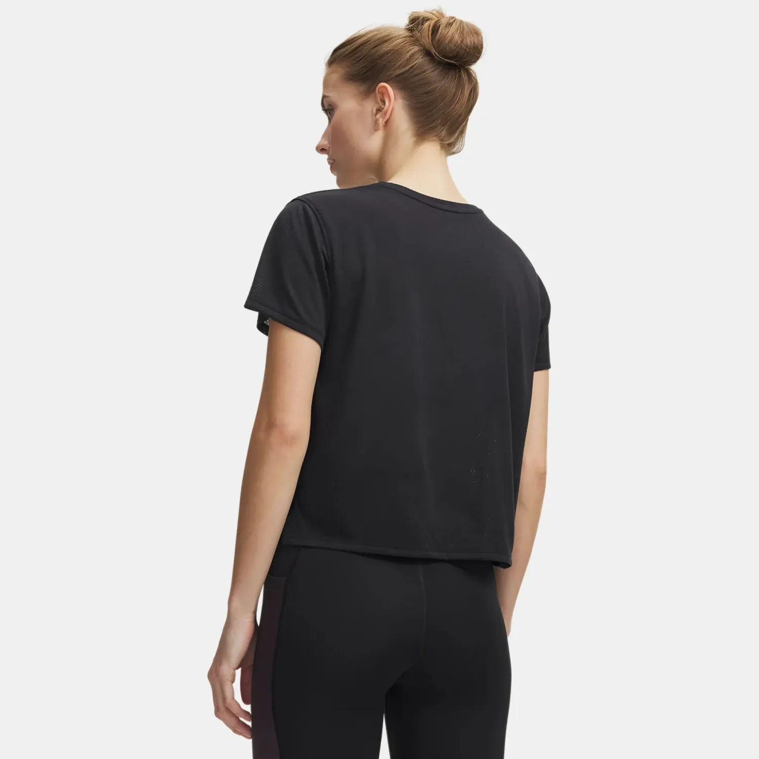Polo Under Armour Running Mujer Velociti Shortsleeve color negro | Platanitos