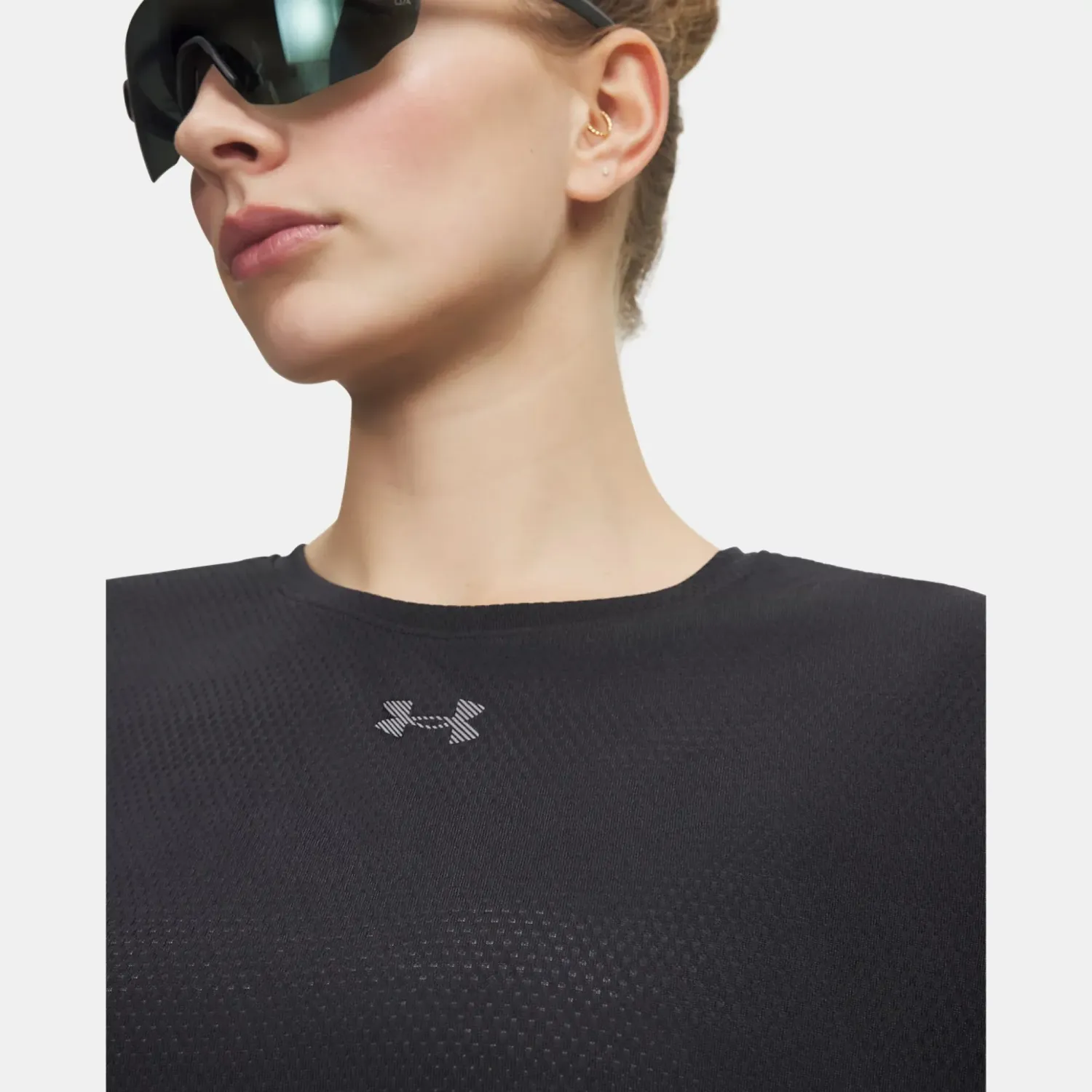 Polo Under Armour Running Mujer Velociti Shortsleeve color negro | Platanitos