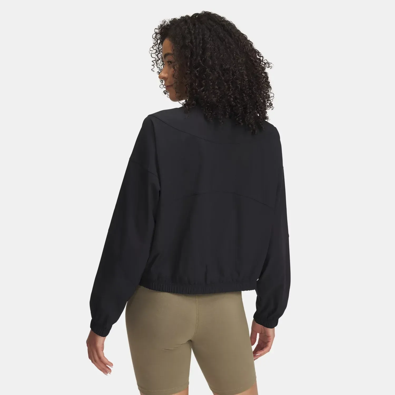 Under Armour Casaca Under Armour Deportiva Mujer Rival Woven color negro | Platanitos