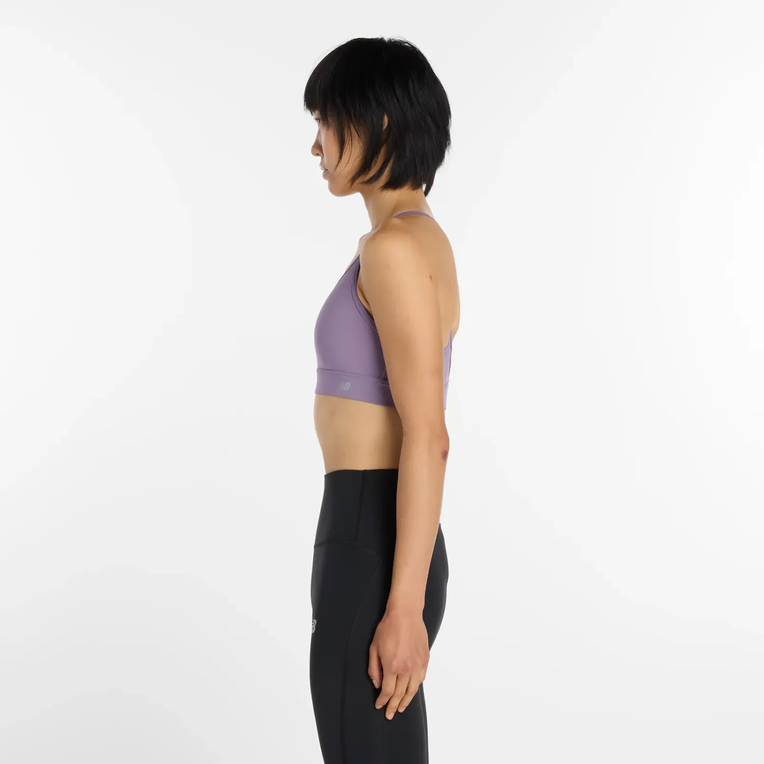 Top New Balance Training Mujer Nb Essential Yoga Bra color violeta | Platanitos
