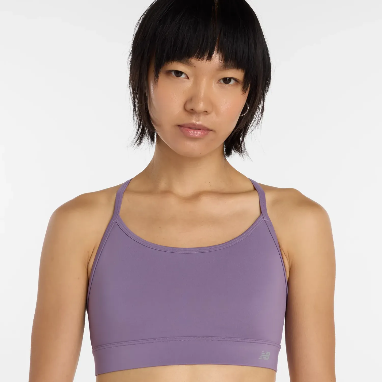 Top New Balance Training Mujer Nb Essential Yoga Bra color violeta | Platanitos