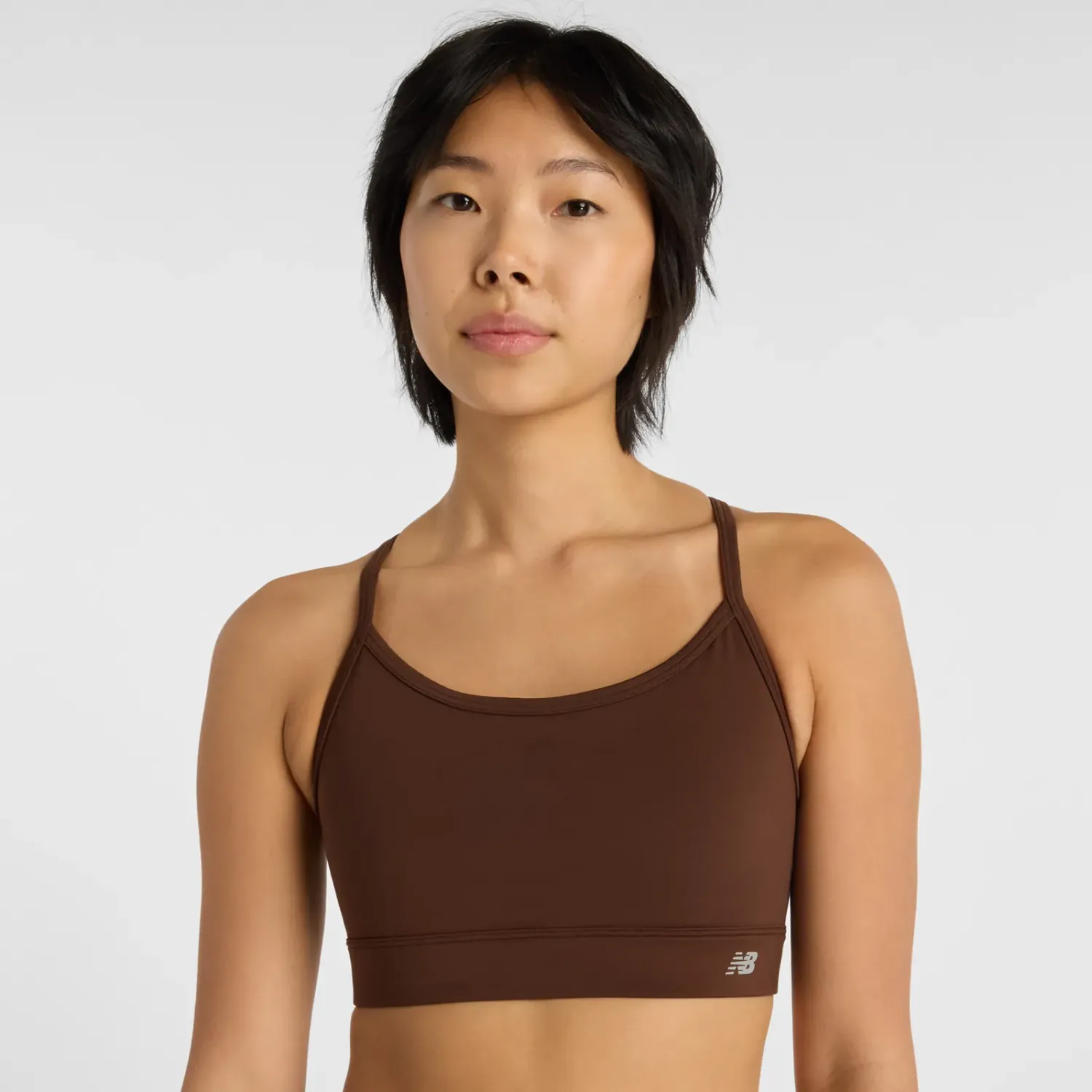 Top New Balance Training Mujer Nb Essential Yoga Bra color marron | Platanitos