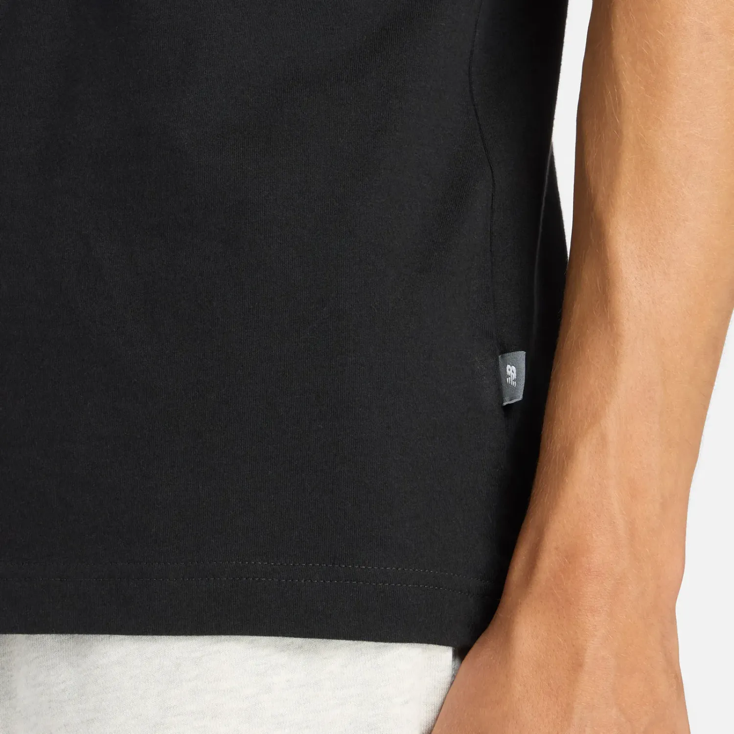 Polo New Balance Deportiva Hombre Miler T-Shirt color negro | Platanitos