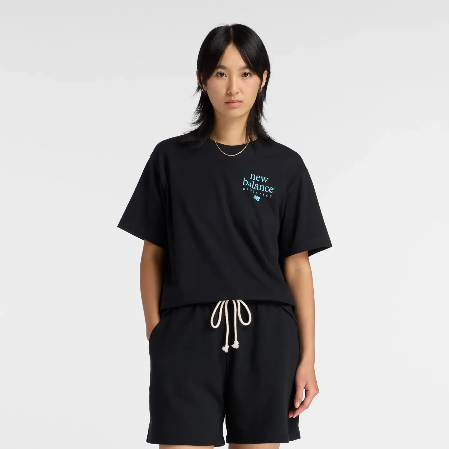 Polo New Balance Deportiva Mujer Lc Athletics T-Shirt color negro | Platanitos