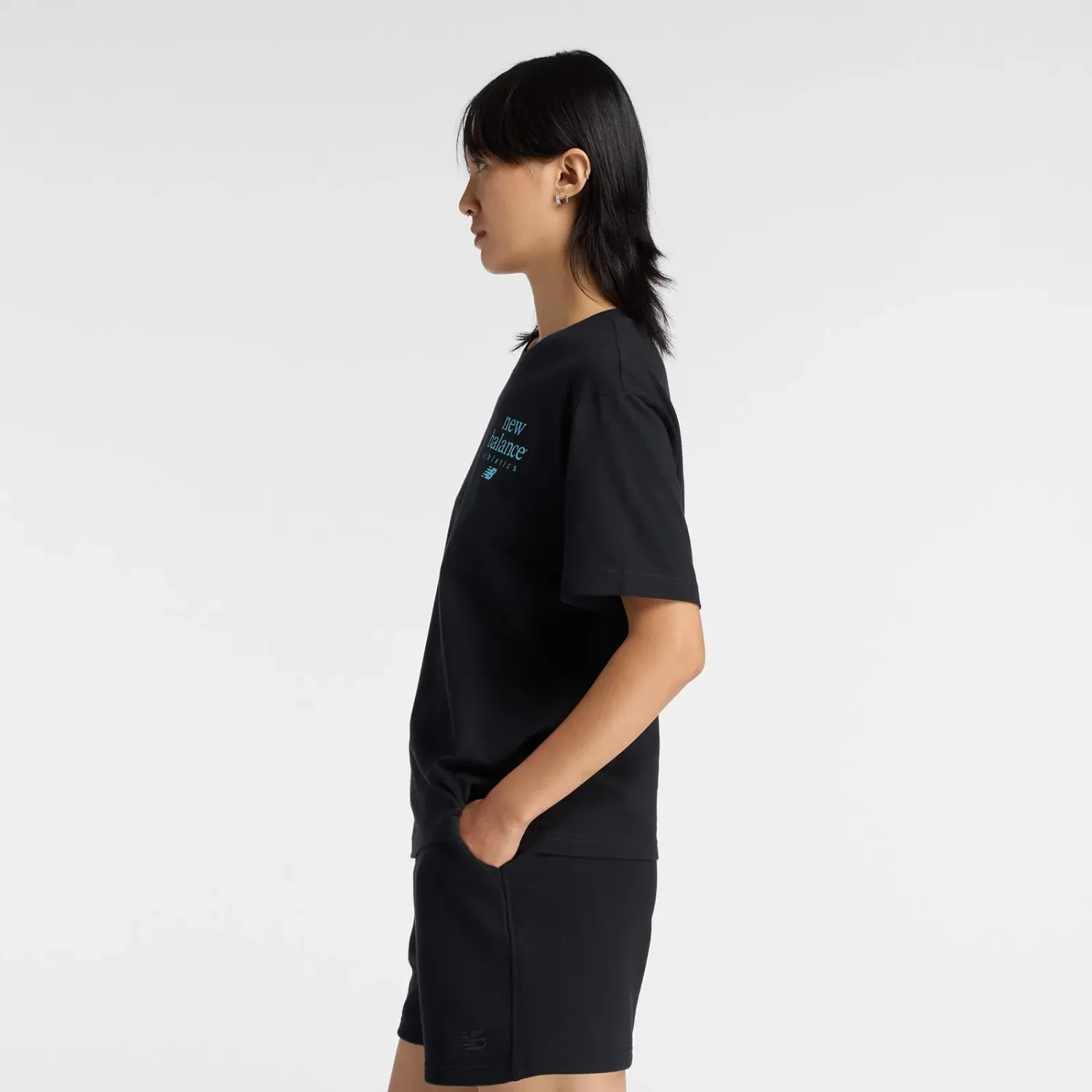 Polo New Balance Deportiva Mujer Lc Athletics T-Shirt color negro | Platanitos