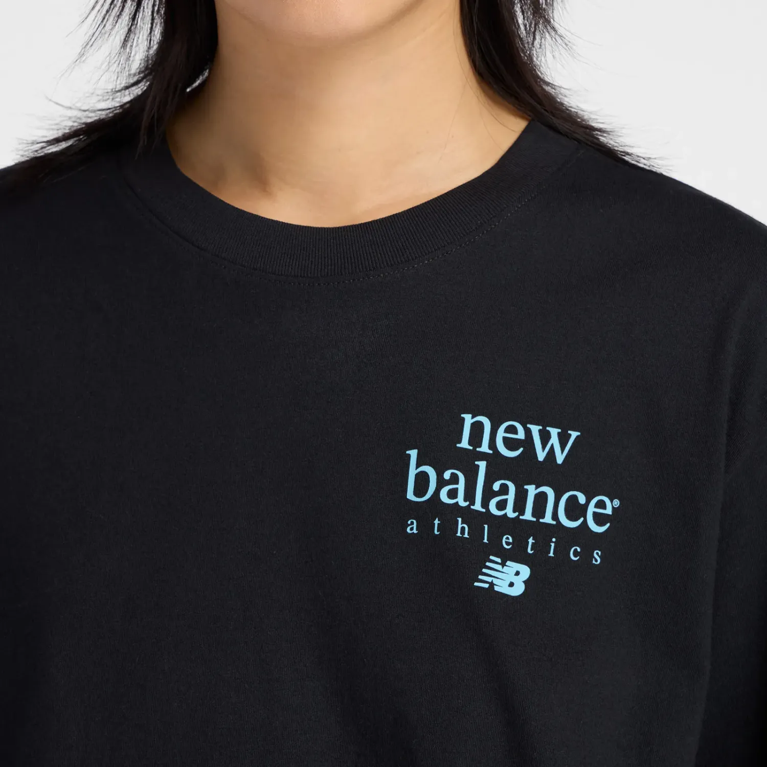 Polo New Balance Deportiva Mujer Lc Athletics T-Shirt color negro | Platanitos