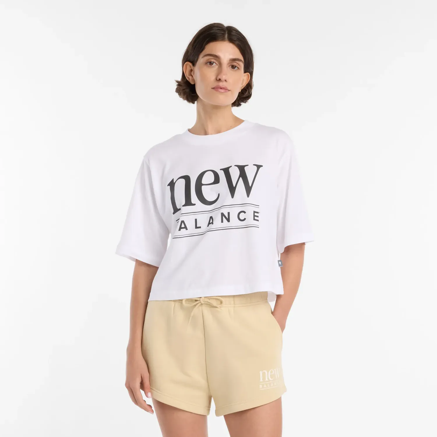 Polo New Balance Deportiva Mujer Reimagined Relaxed T-Shirt color blanco | Platanitos