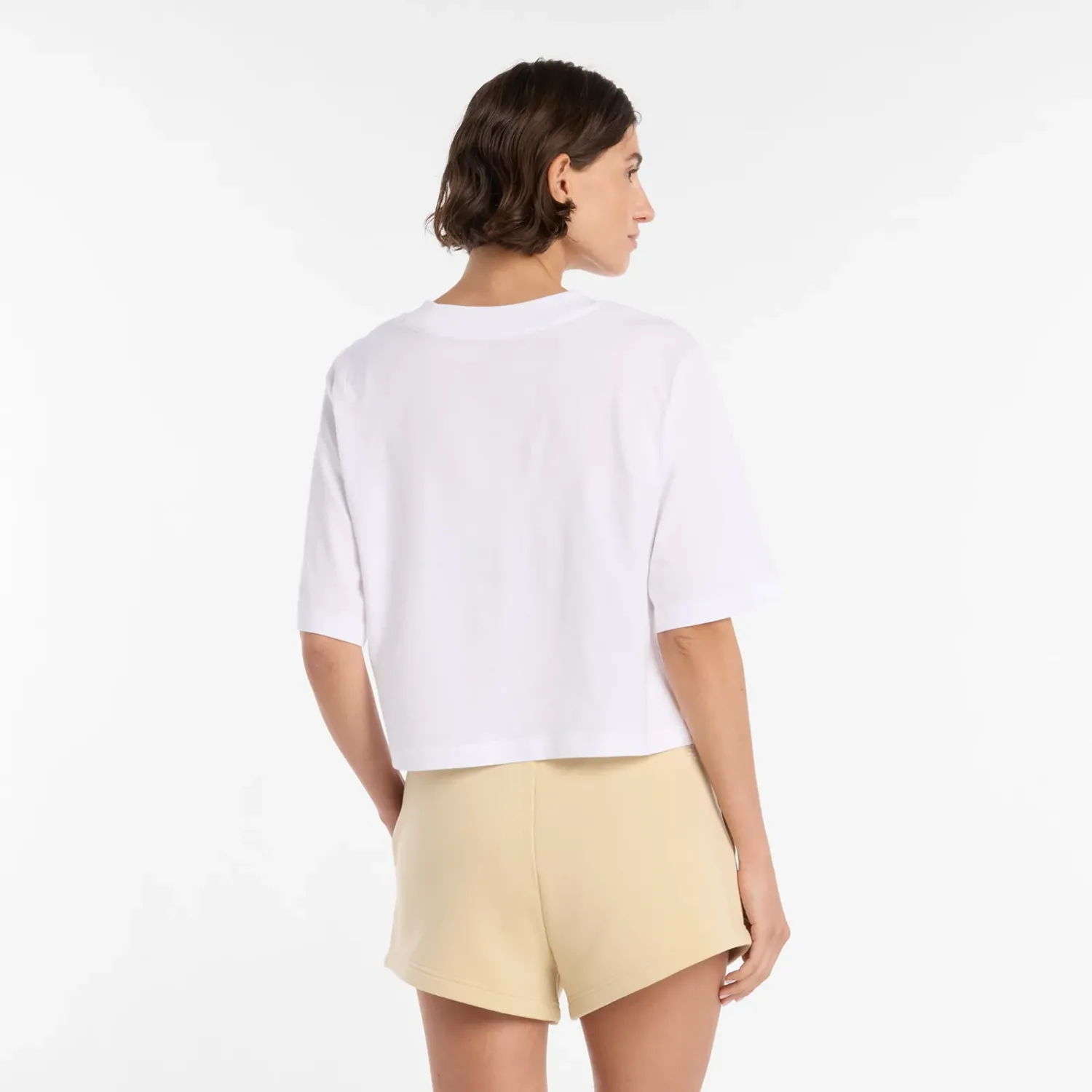 Polo New Balance Deportiva Mujer Reimagined Relaxed T-Shirt color blanco | Platanitos