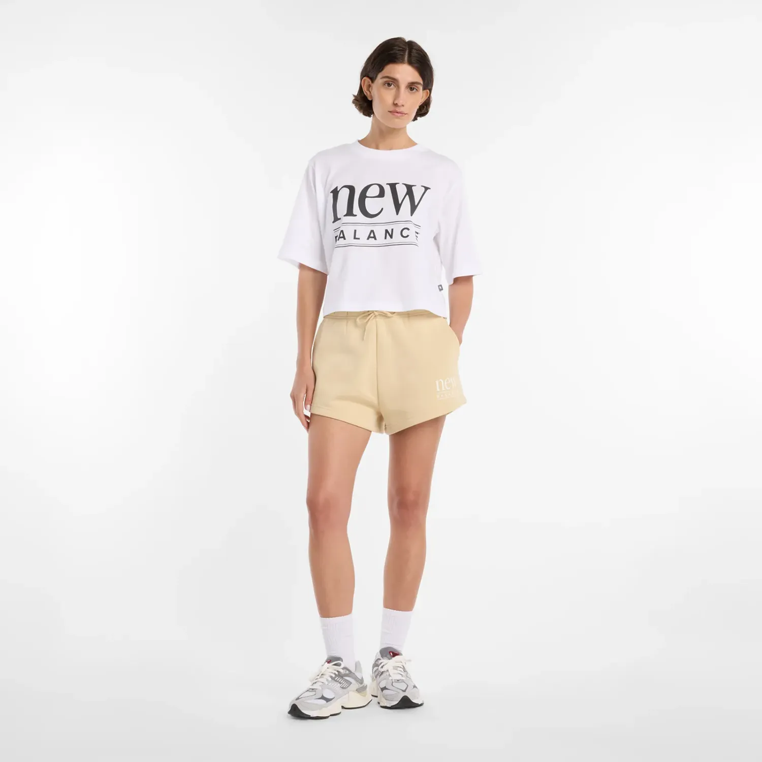 Polo New Balance Deportiva Mujer Reimagined Relaxed T-Shirt color blanco | Platanitos