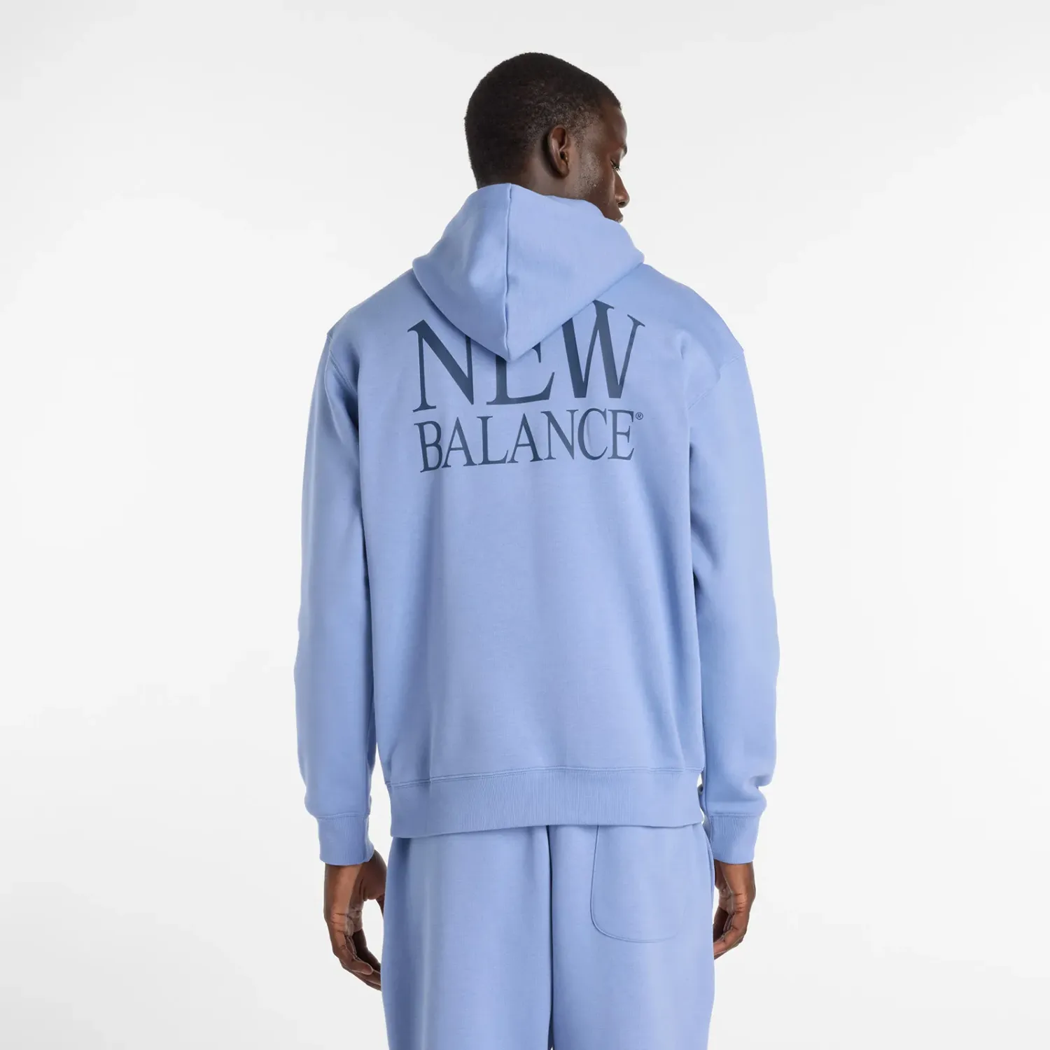 Polera New Balance Deportiva Hombre Reimagined Fleece Hoodie color azul | Platanitos