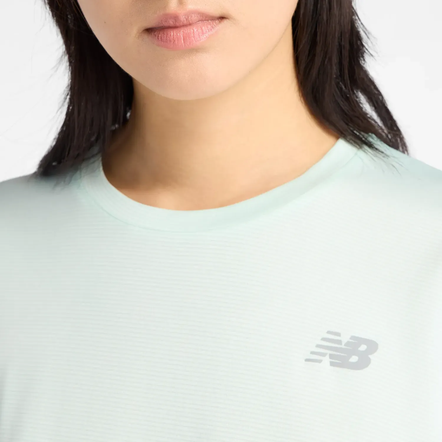 Polo New Balance Running Mujer Sport Essentials T-Shirt color menta | Platanitos