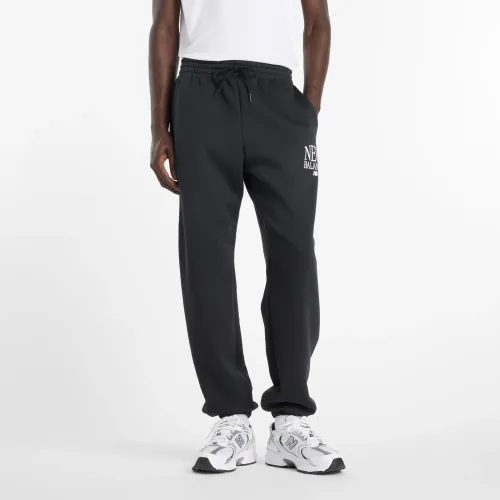 Jogger New Balance Deportiva Hombre Reimagined Fleece Jogger color negro | Platanitos