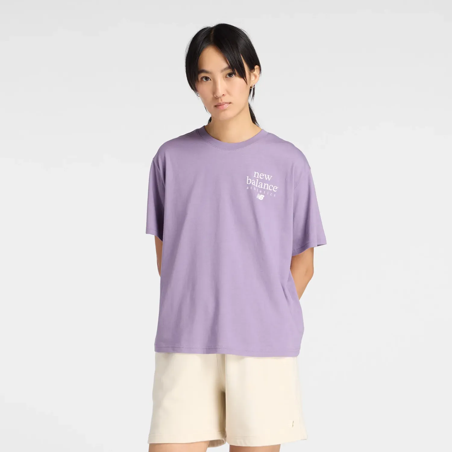 Polo New Balance Deportiva Mujer Lc Athletics T-Shirt color violeta | Platanitos