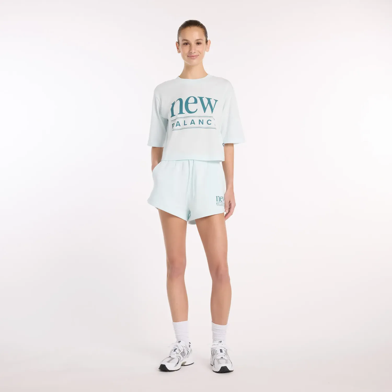 Polo New Balance Deportiva Mujer Reimagined Relaxed T-Shirt color menta | Platanitos