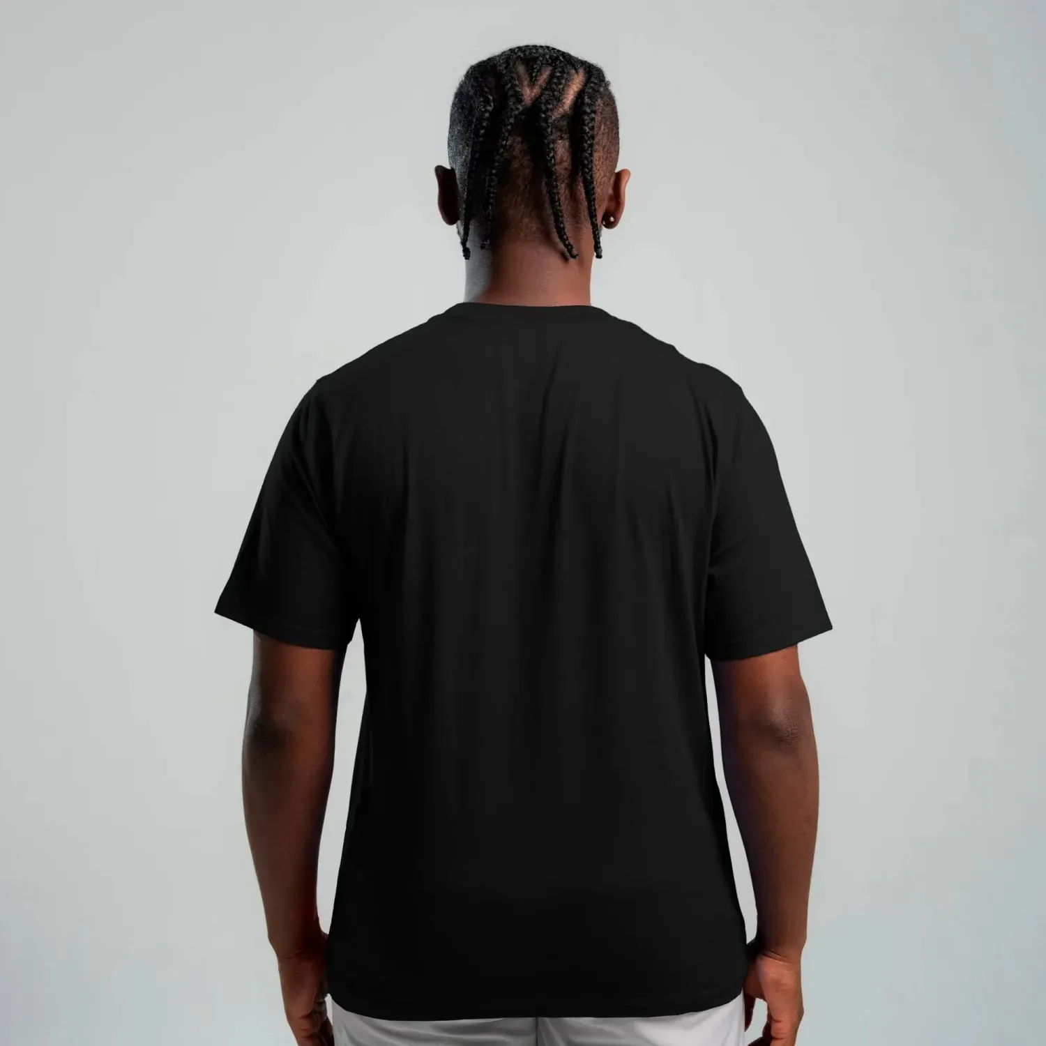 Polo Reebok Deportiva Hombre Mid Stack Logo color negro | Platanitos