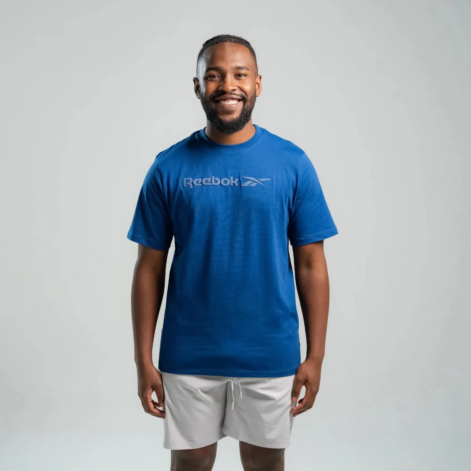 Polo Reebok Deportiva Hombre Big Long Logo color azul | Platanitos