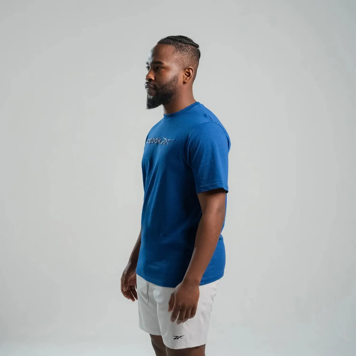 Polo Reebok Deportiva Hombre Big Long Logo color azul | Platanitos