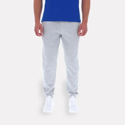 Pantalon Reebok Deportiva Hombre Andre Small Logo Cuffed color gris | Platanitos