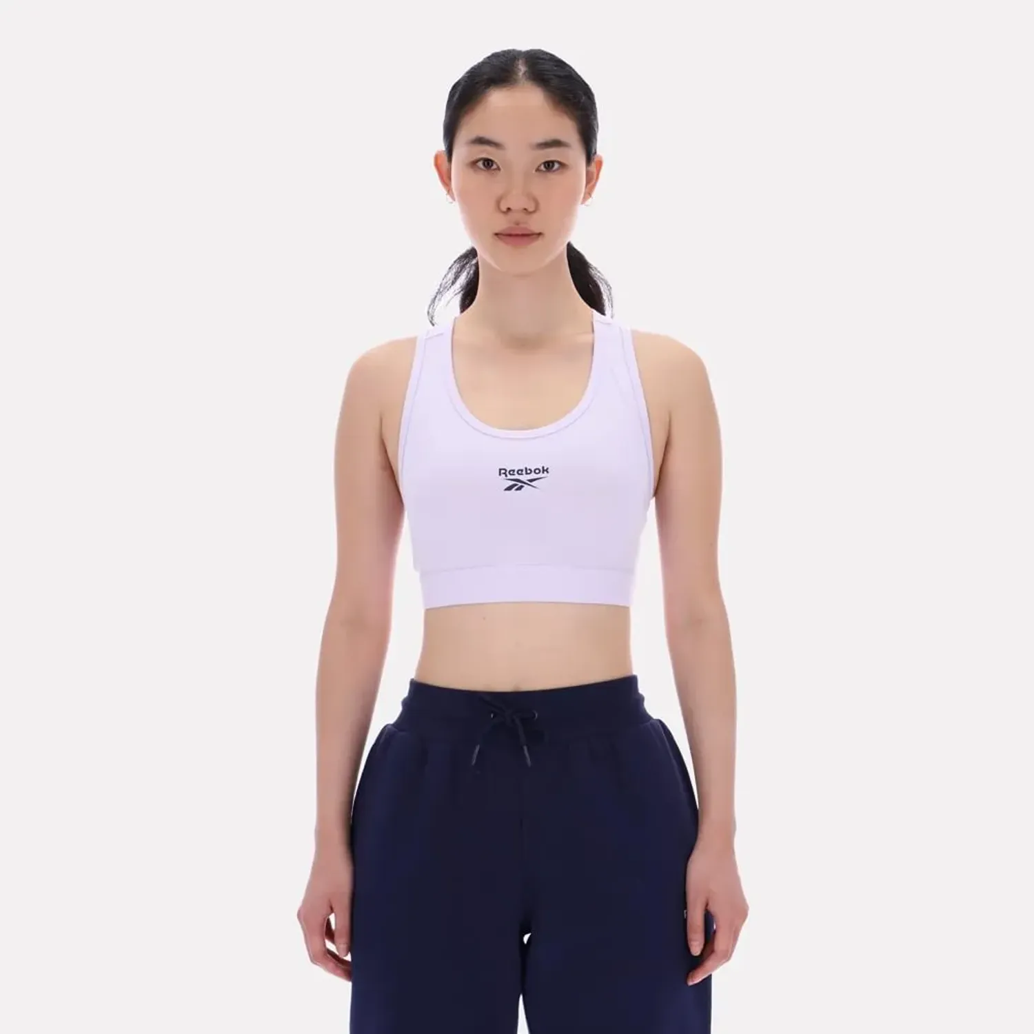 Top Reebok Deportiva Mujer Piper Scoop Neck Small Logo color morado | Platanitos