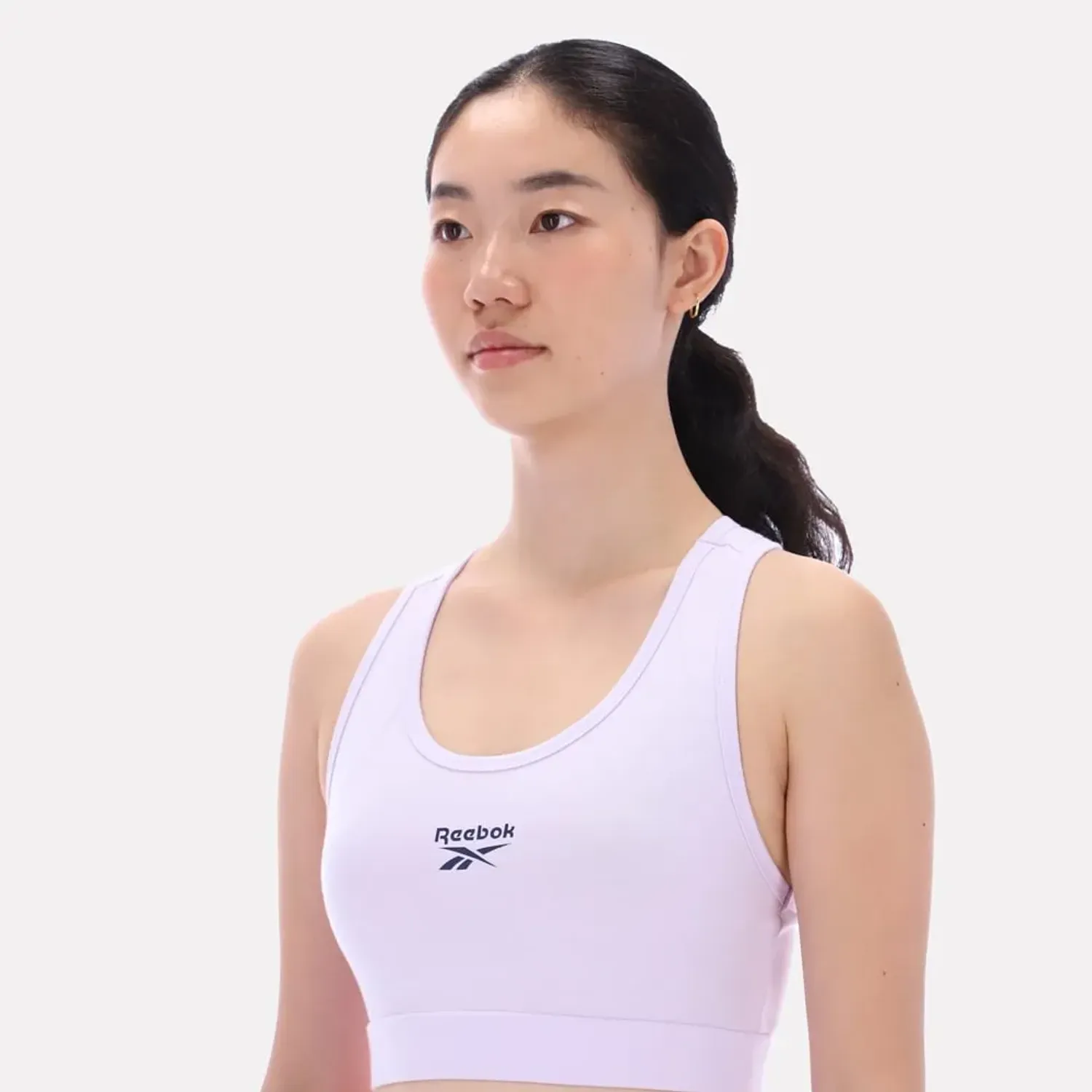 Top Reebok Deportiva Mujer Piper Scoop Neck Small Logo color morado | Platanitos