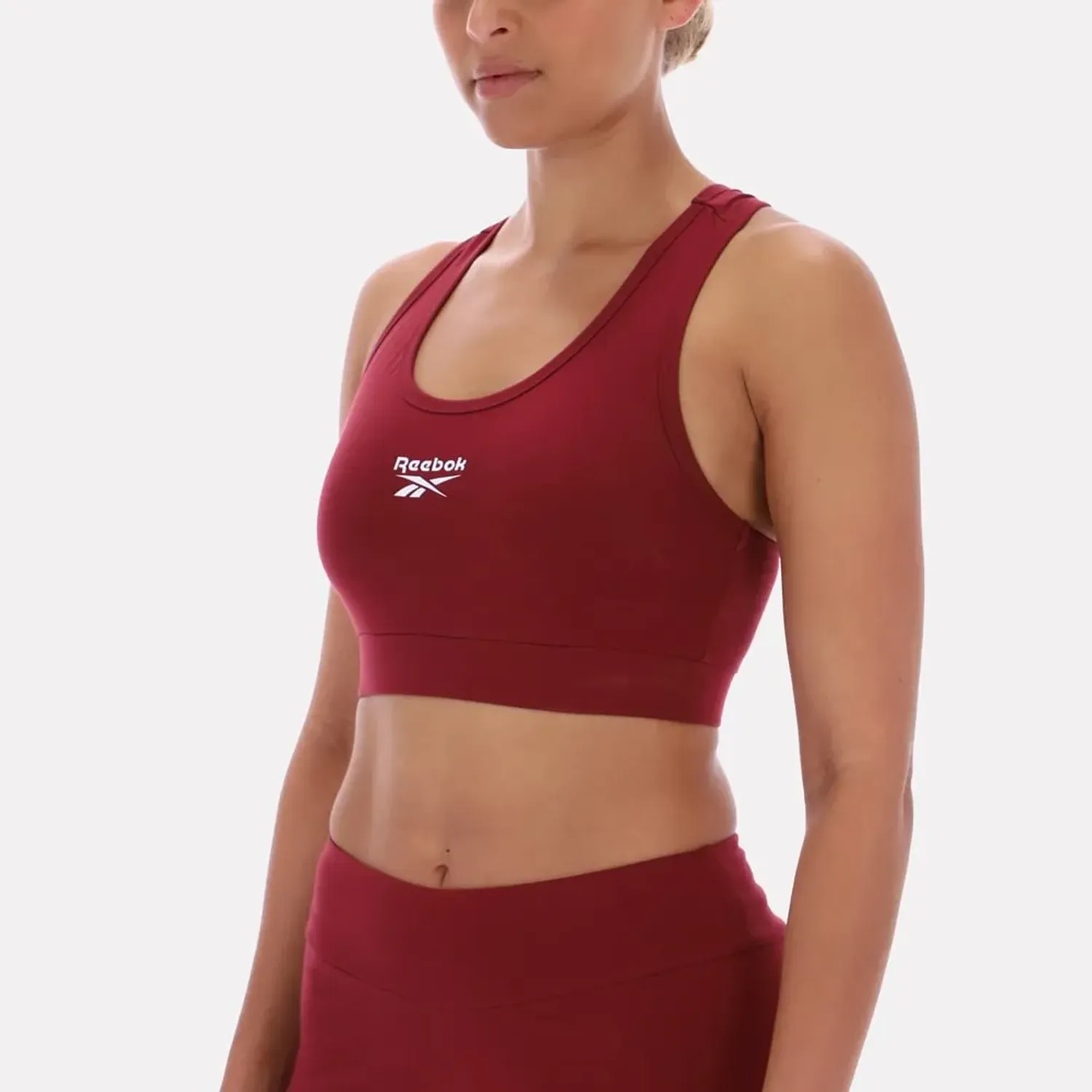 Top Reebok Deportiva Mujer Piper Scoop Neck Small Logo color rojo | Platanitos