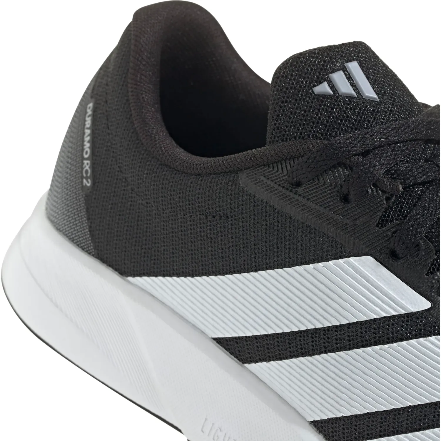 Zapatillas Adidas Running Mujer Duramo Rc2 W color negro / blanco | Platanitos
